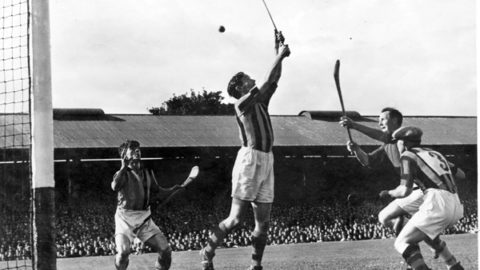 Jim Donegan, Kilkenny Goalie attempts a save in the 1947 All Ireland SH Final.