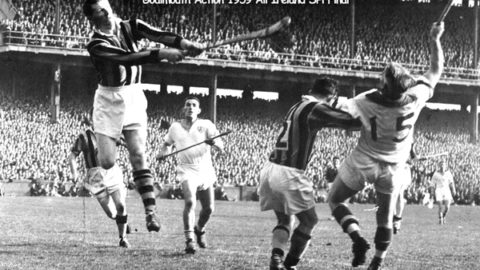 Ollie Walsh makes a save in the 1959 All Ireland Final while under pressure from Larry Guinan while Tom Walsh takes care of John Kiely.