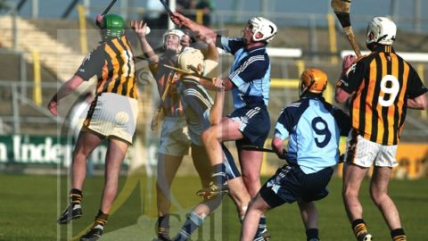 Hot ball - T.J. Reid (Kilkenny gets his hand to the sliotar despite the challenges from Dublins' Tomas Brady, Michael Carton and Simon Lambert during the N.H.L. encounter in Nowlan Park. (Photograph: Eoin Hennessy)