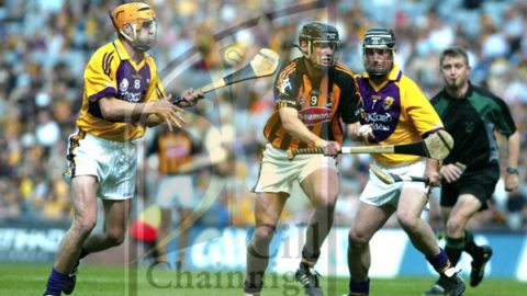Jackie Tyrrell (Kilkenny) breaks through the challenges of Eoin Quigley and Darren Stamp (Wexford) during the Senior Hurling Leinster Final in Croke Park. (Photo: Eoin Hennessy)